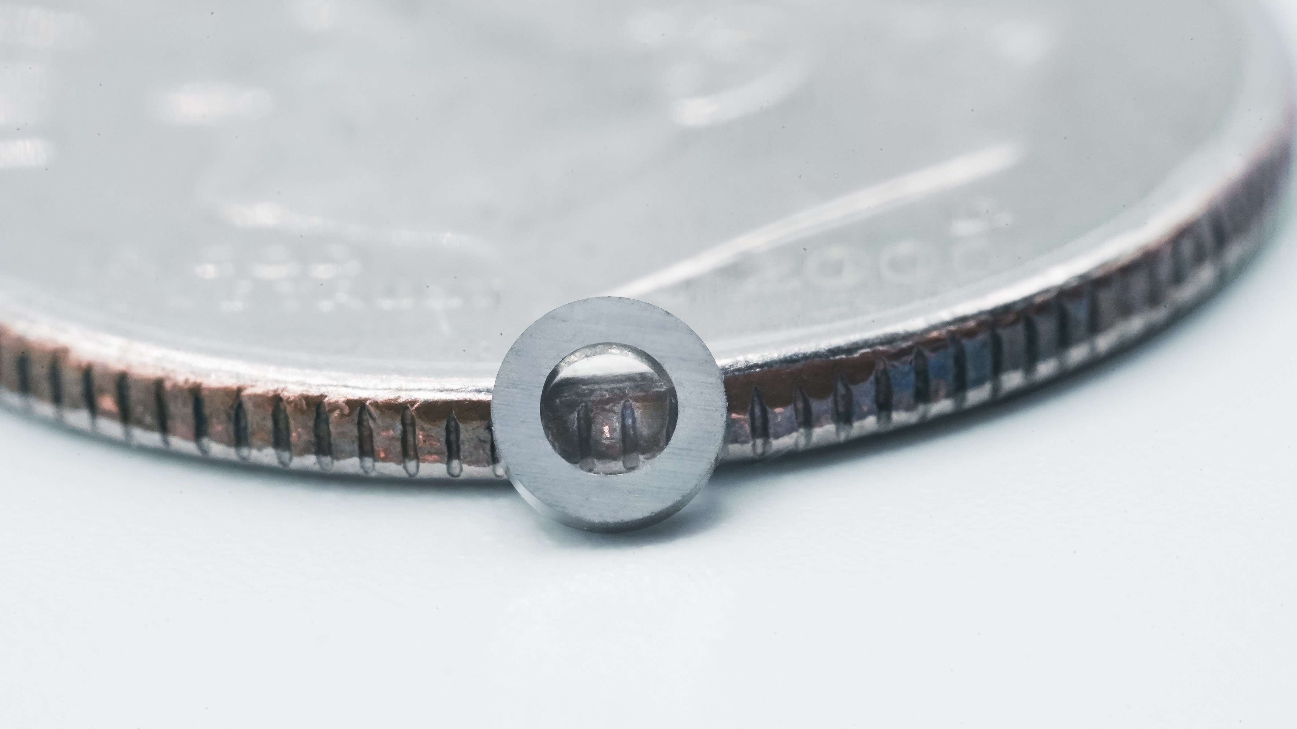 Hyperion Bearing Raceway compared to a coin size.