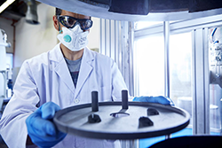 Scientist working with equipment